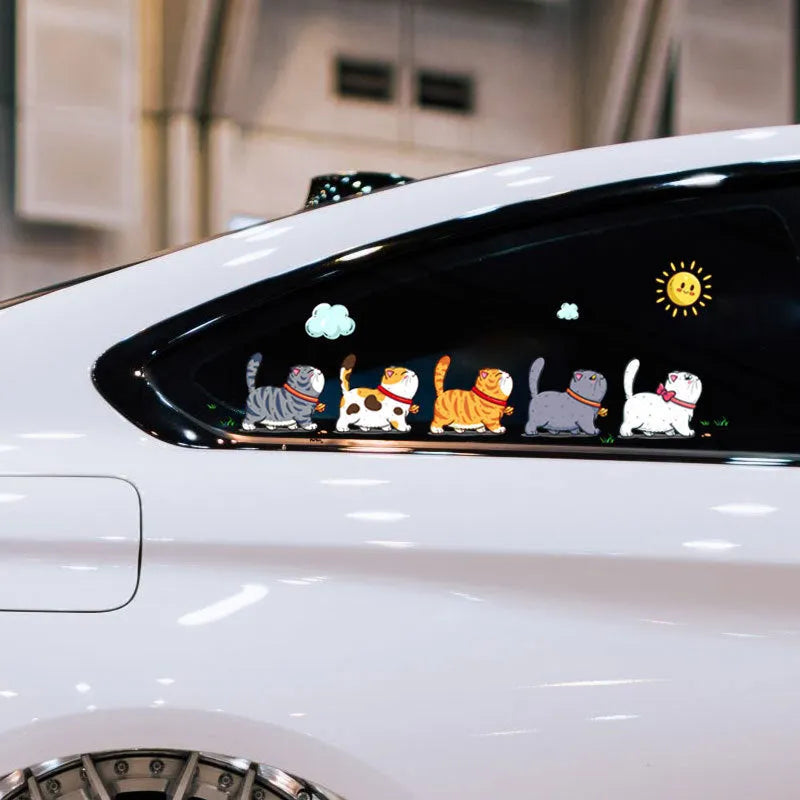 Climbing cats car sticker on vehicle, showing five walking cat design in waterproof PVC material.