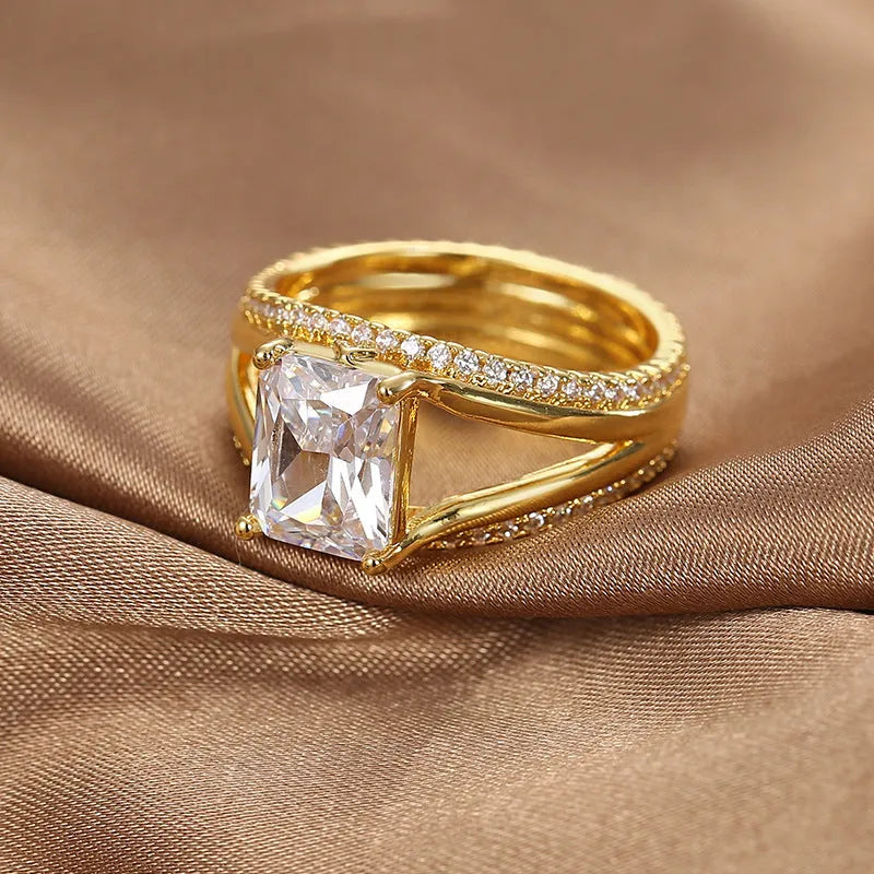 Geometric women's ring with square zircon stone on gold electroplated copper band