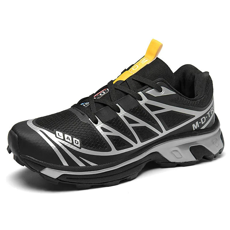 Men's and women's low-top hiking shoes in khaki colour with round toe and lace-up front.
