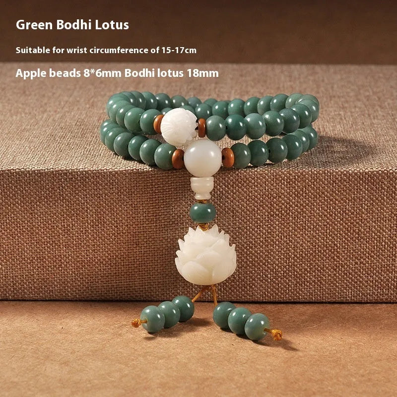 Bodhi seed bracelet with double ring safety buckle and lotus design on round beads