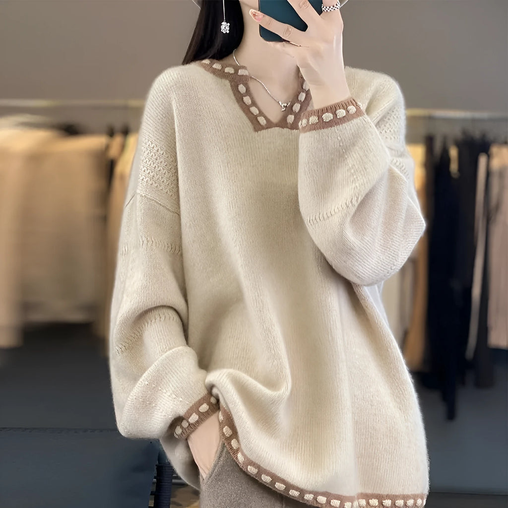 Women's camel coloured V-neck pullover sweater with long sleeves, made from viscose fibre.