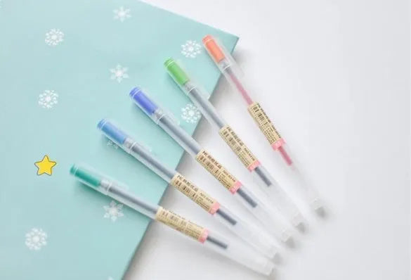 Pack of twelve Muji gel pens with clear barrels and 0.5mm fine black ink nibs