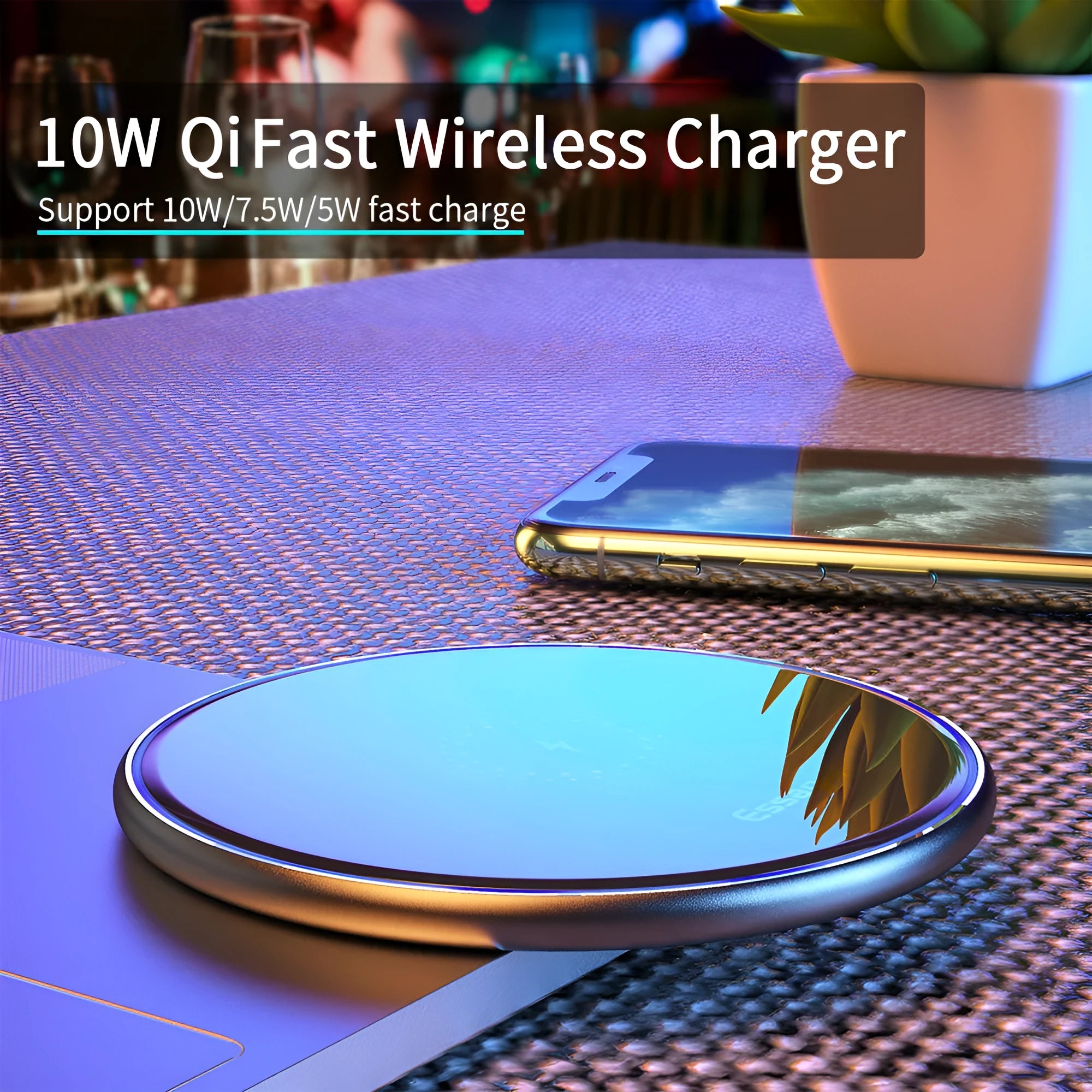 Black 15W Qi fast wireless charging pad with aluminium body and LED light, shown next to a smartphone.