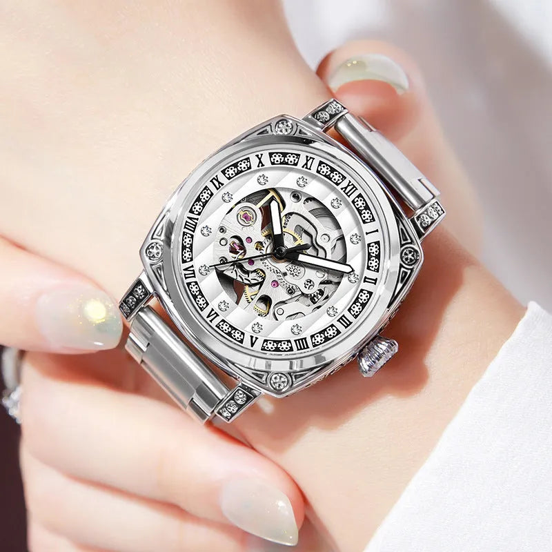 Mechanical watch with luminous hands and a leather strap, shown in various dial colour options.