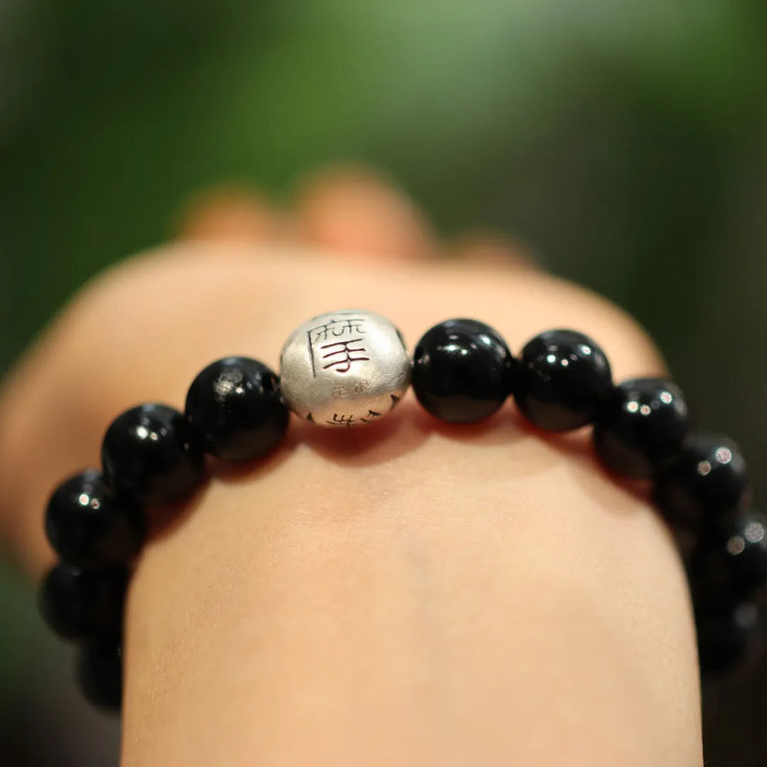 Black agate bracelet with sterling silver components in Chinese jewellery style