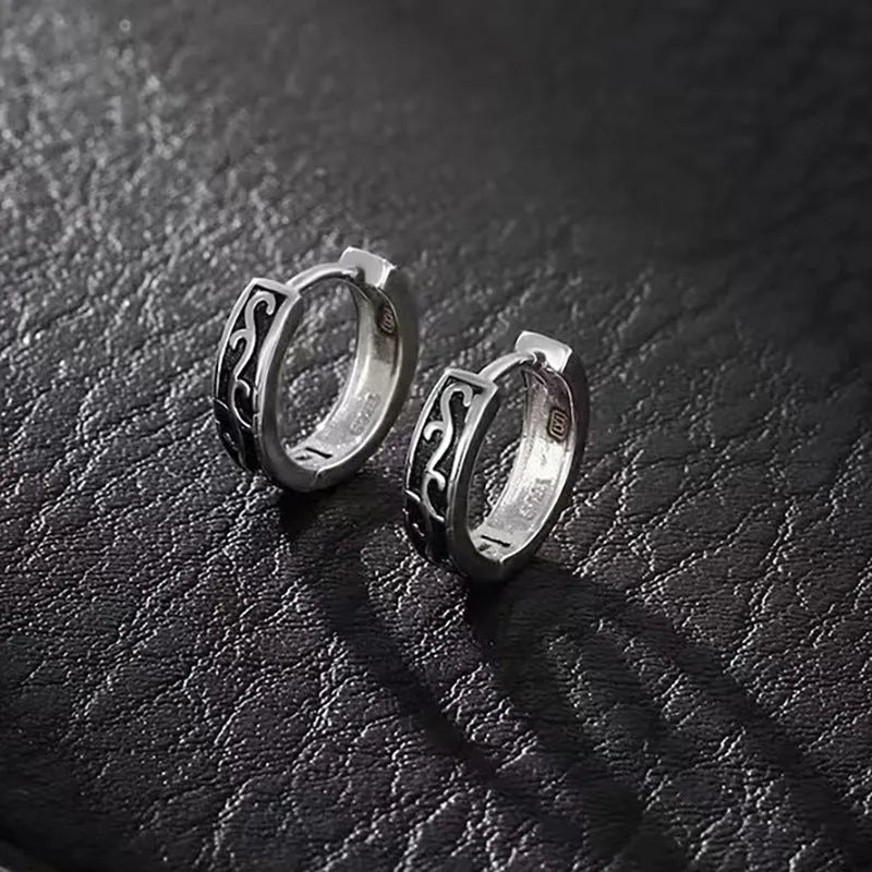 Silver geometric copper stud earrings for men in 10mm and 14mm sizes, shown singly and as a pair.