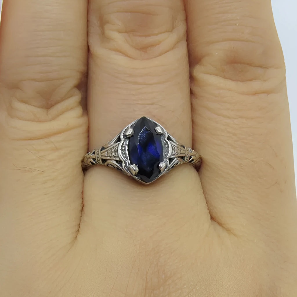 Silver geometric hollow alloy ring with zircon detailing shown in women's sizes 5 to 11