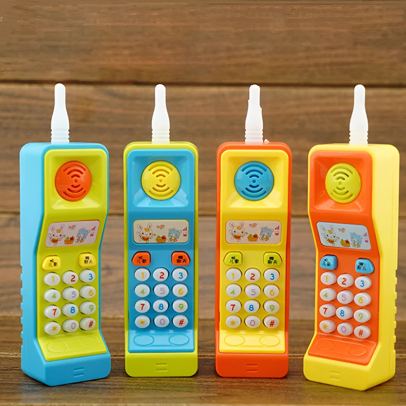 Children's electronic educational toy with sound and light effects featuring cartoon animal designs