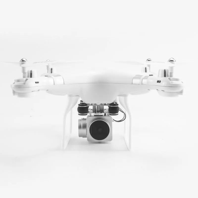Black HD aerial photography drone with alloy body and remote control handle on a table.