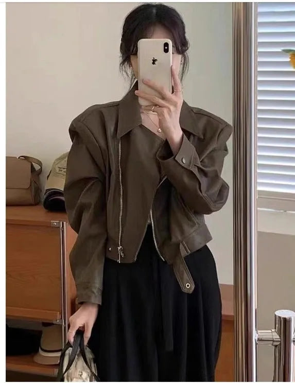 Brown women's retro slim-fit imitation leather coat with a pocket and regular sleeves.