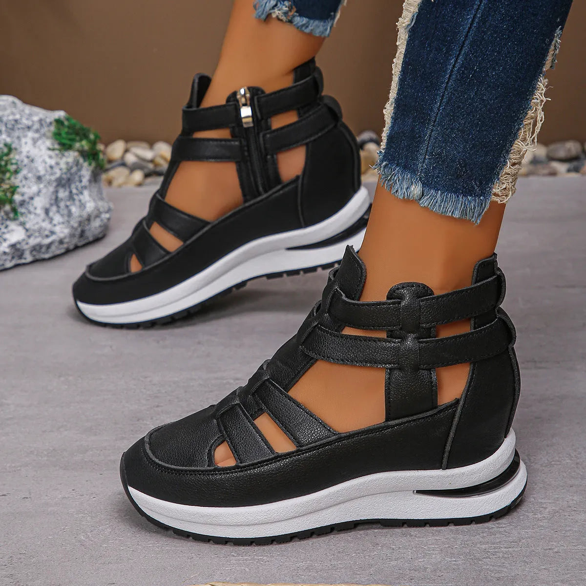 Women's black hollow-out platform sandals with round toe and Velcro strap fastening.