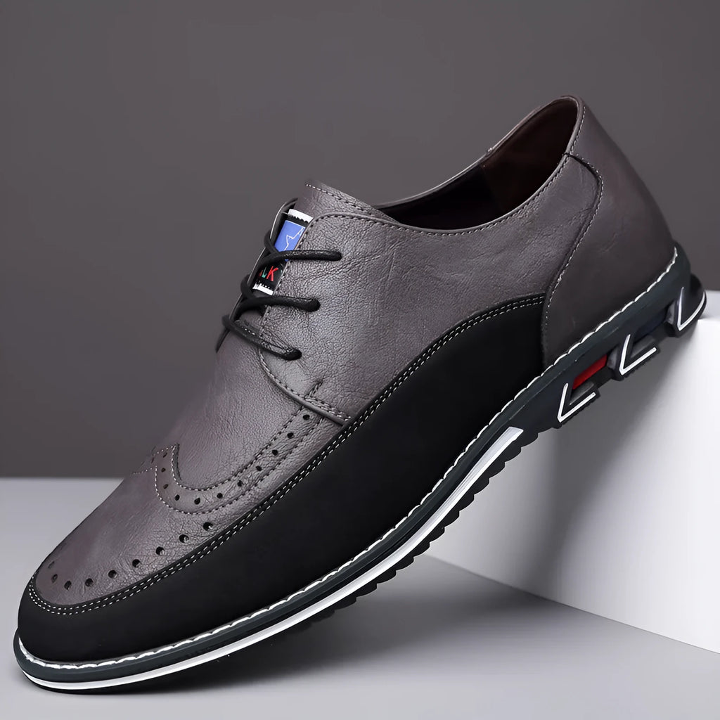 Men's casual leather shoes in black with rubber sole, low top, and leather toe cap.