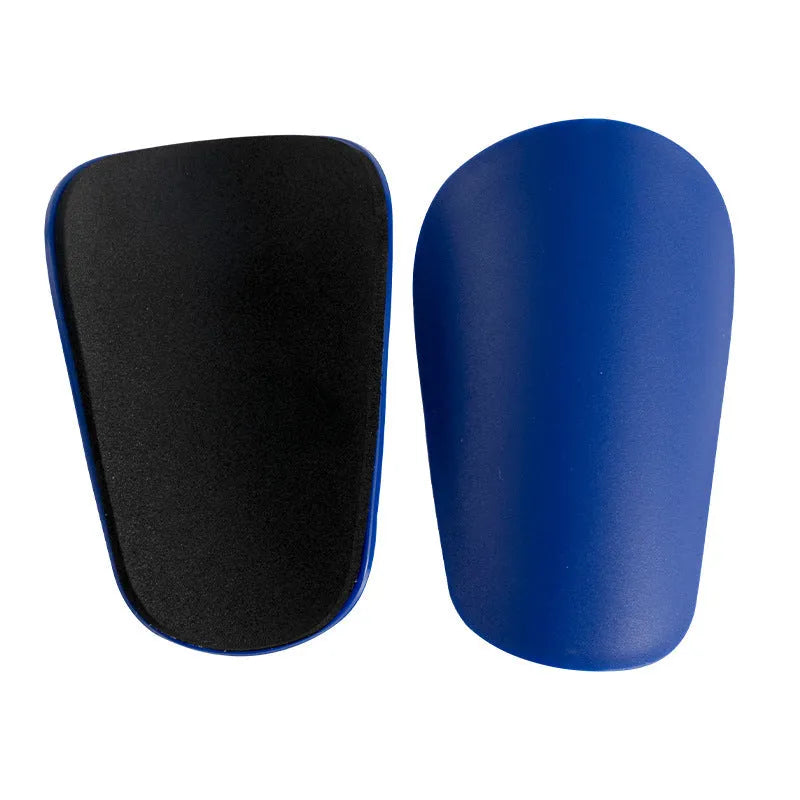 PU mini shin guards in various colours on a leg, showing S and XS sizing for sports protection.