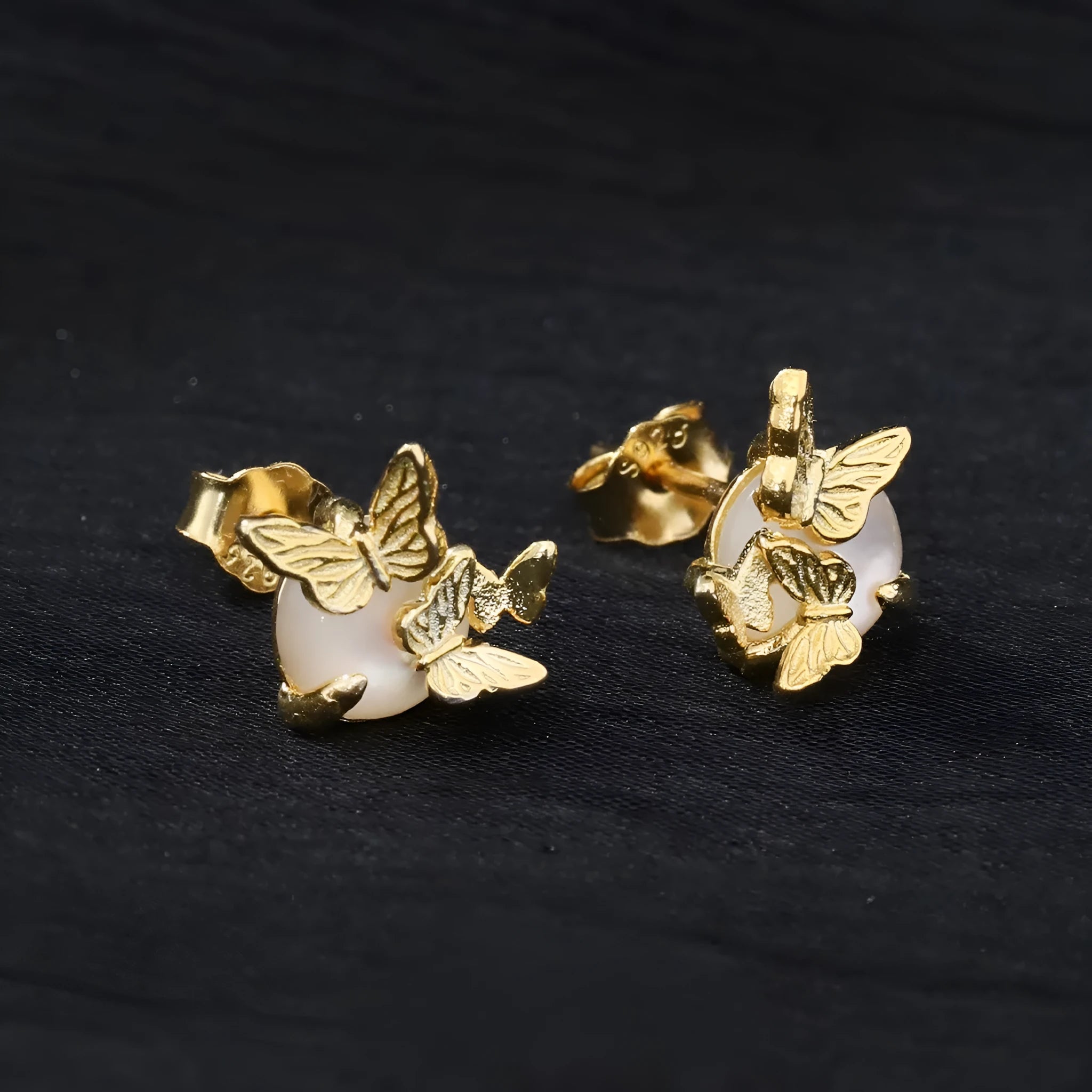 925 silver butterfly ear studs for women in white gold or gold colour finish.