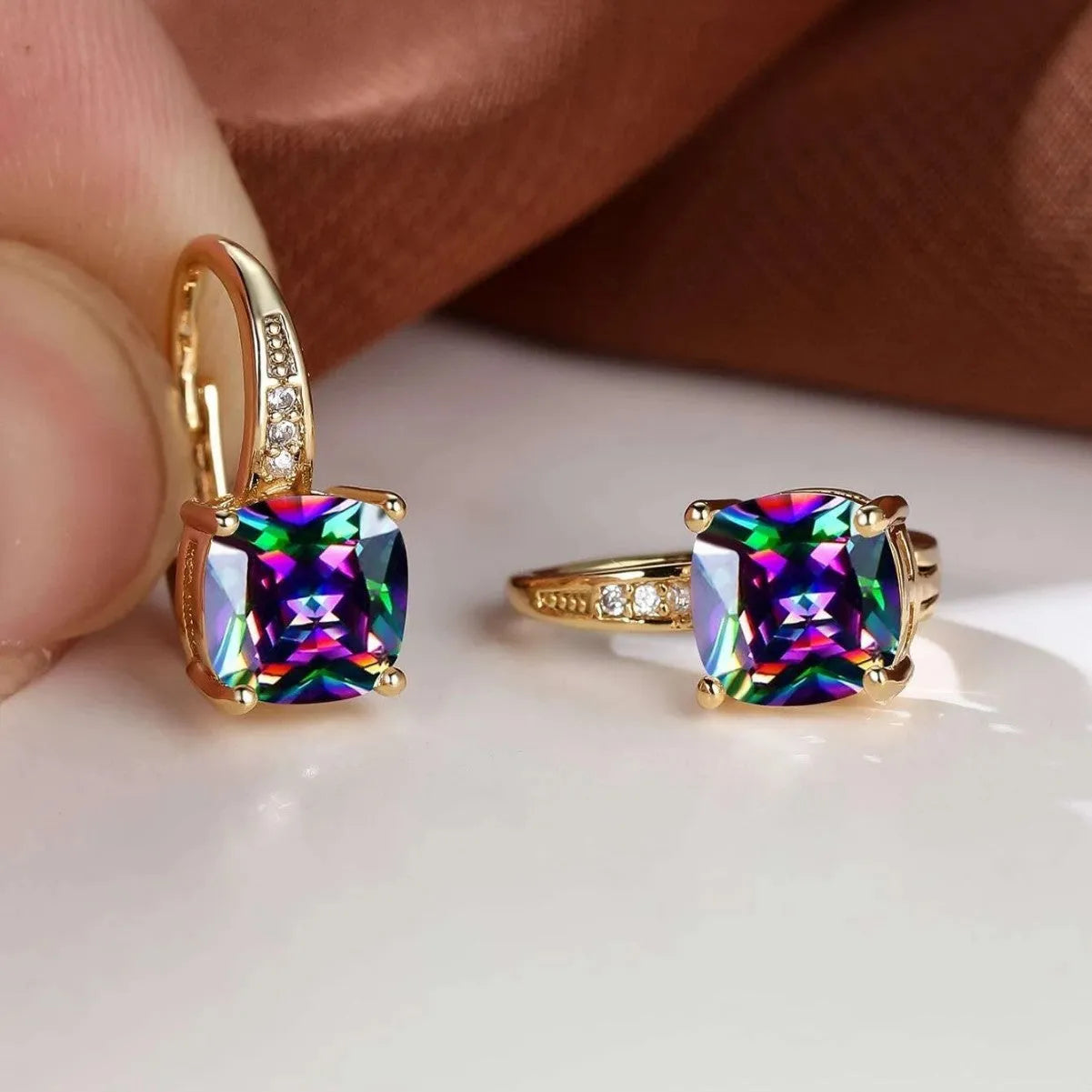 Square geometric copper ear clip with colourful moissanite inlays and electroplated gold finish