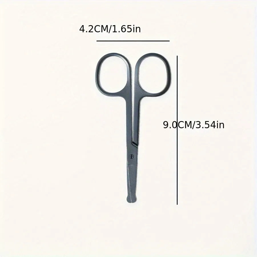 Black handheld pet grooming brush with a soft silicone head for eye tear stain removal.