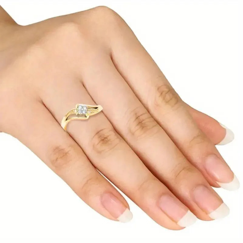 Diamond-shaped yellow gold tone copper ring with micro-inlaid zircon stones on finger