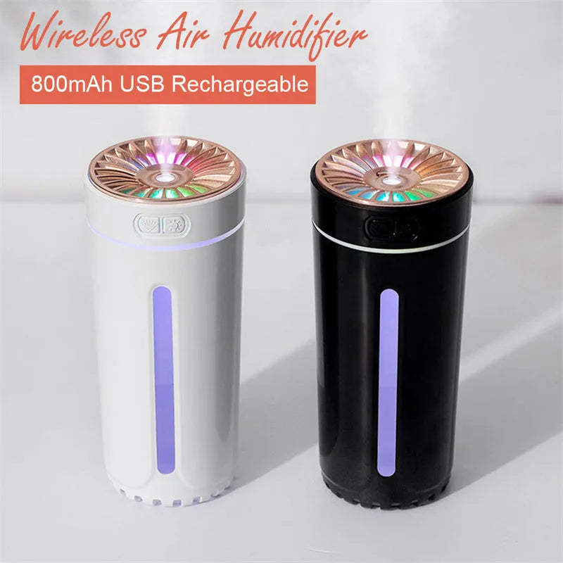Black portable USB humidifier with colourful LED lights, shown next to a USB cable, suitable for car cup holders.