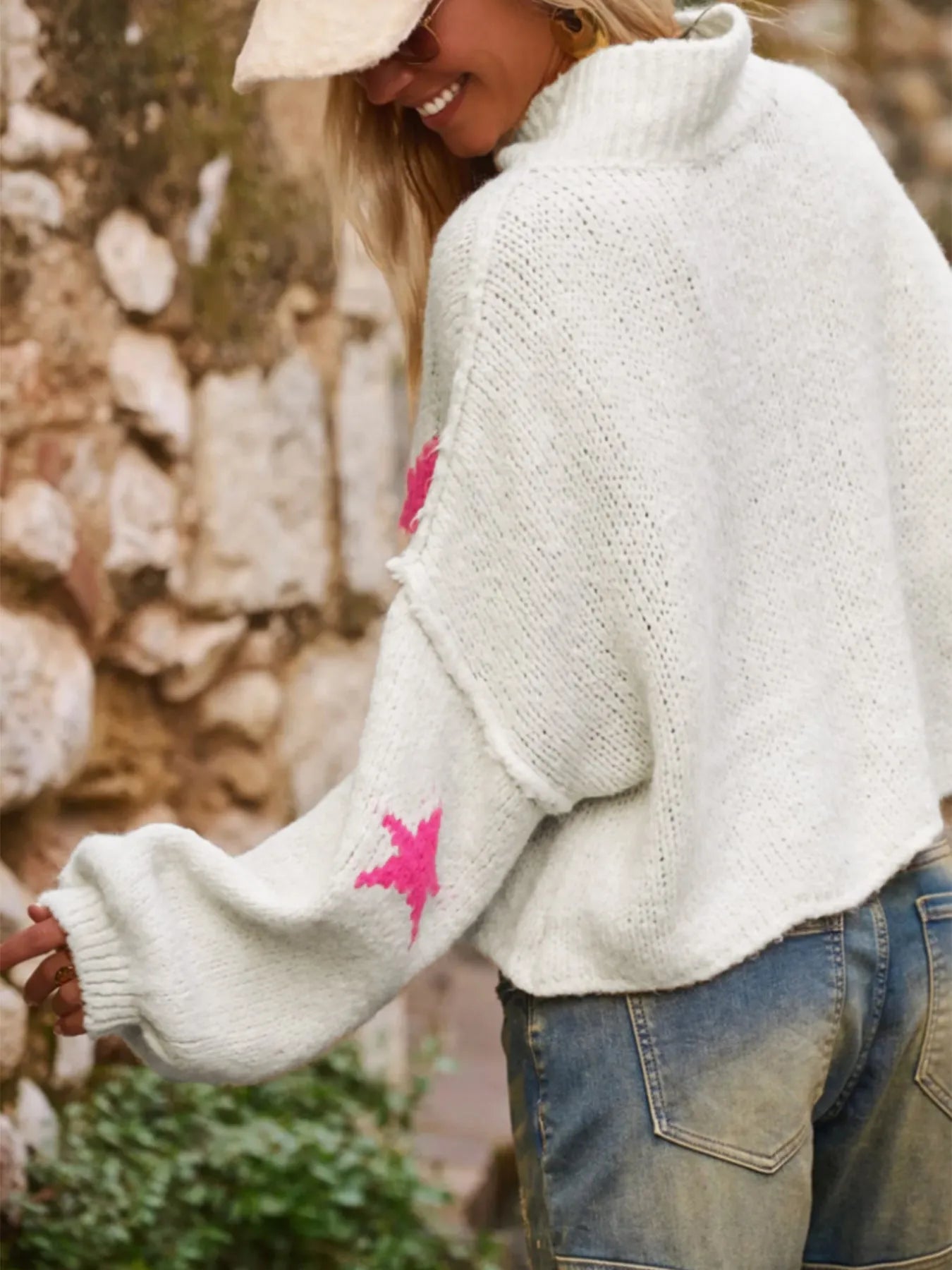 White women's turtleneck pullover with five-pointed star pattern and velvet-like fabric