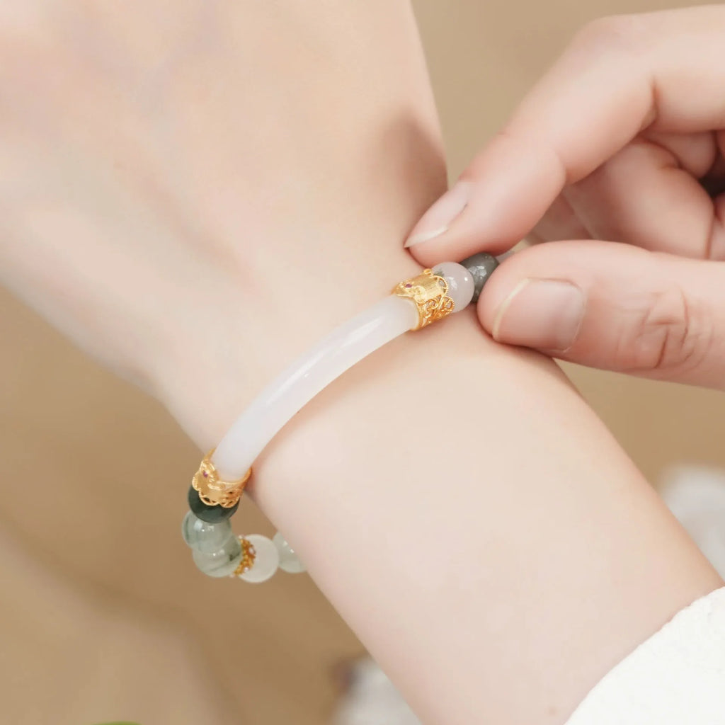 Emerald green Tian Shan Cui jade women's half bracelet with floating flower girl design and round beads