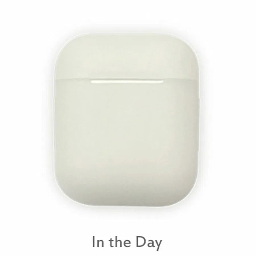 Luminous solid colour silicone flip cover case for Apple AirPods wireless earphones.