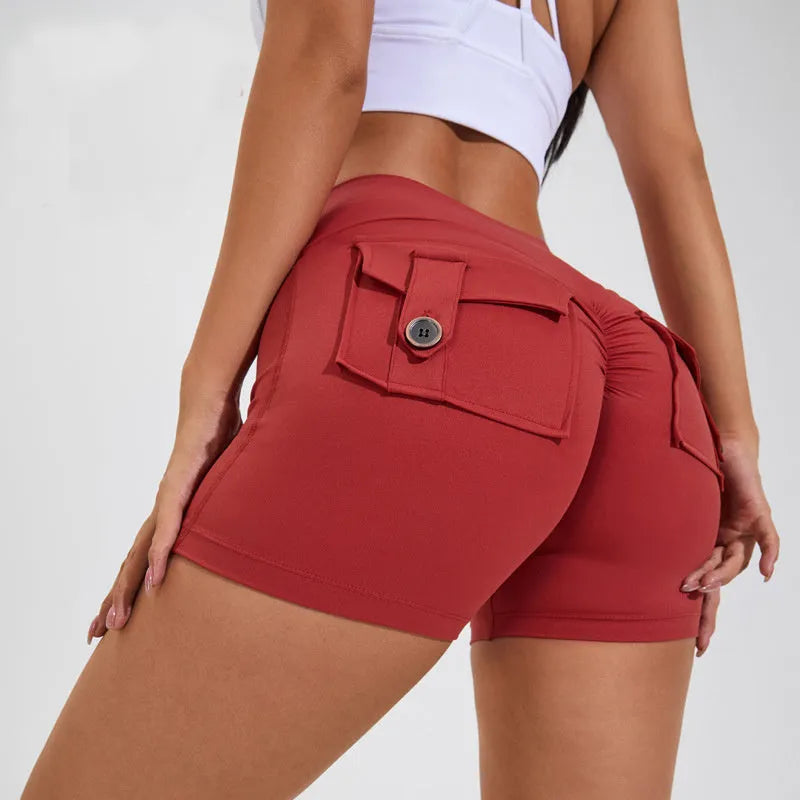 Women's high waist hip lifting shorts with pockets in various colours for fitness activities