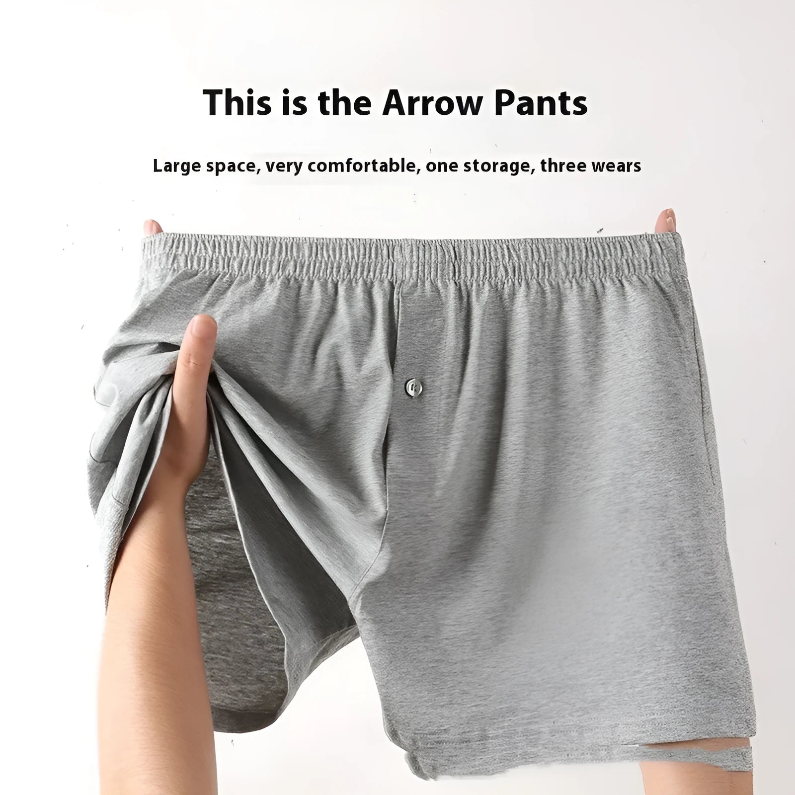 Men's solid colour cotton boxer shorts with a high waist and loose fit on a neutral background.
