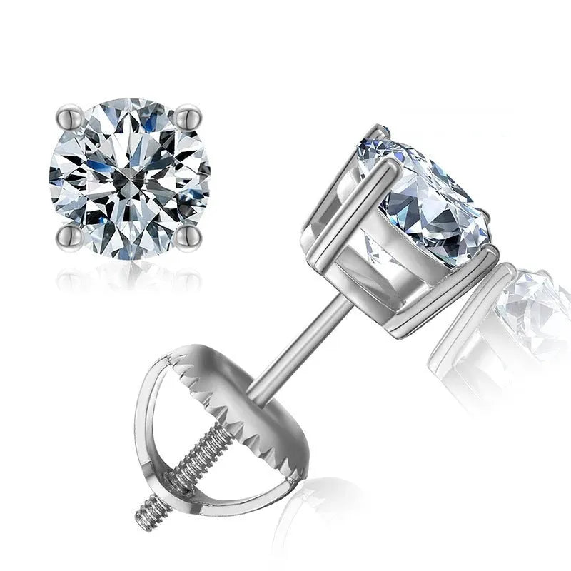Geometric silver four claw moissanite stud earrings with screw back on black card.