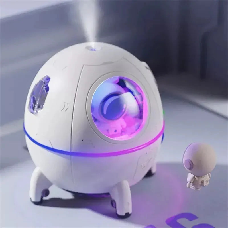 Astronaut-shaped desktop USB humidifier with colourful LED light and 220ml water tank.