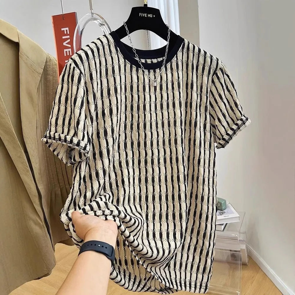 Black and white striped men's loose-fit short sleeve casual shirt made from linen blend fabric.