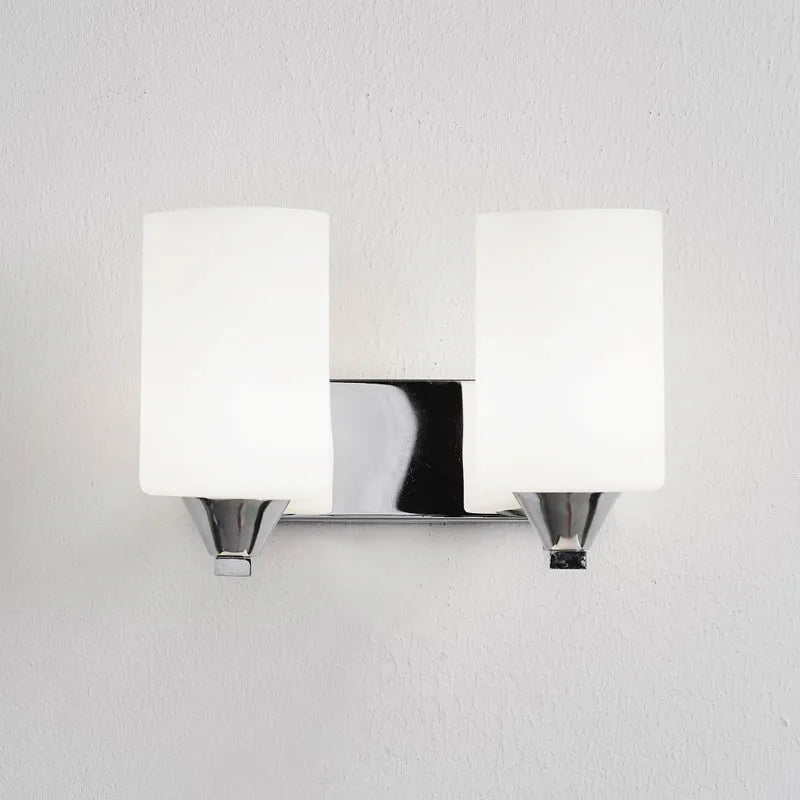 Chrome-finished minimalist glass wall lamp with adjustable dual heads for bedside lighting