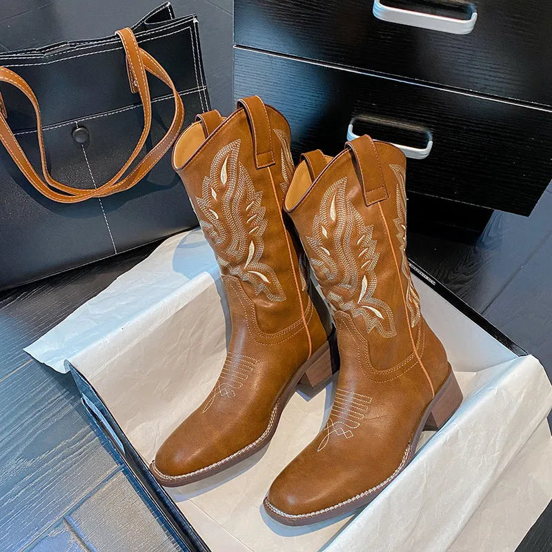 Brown women's mid-calf embroidered Martin boots with leather lining and a square low heel