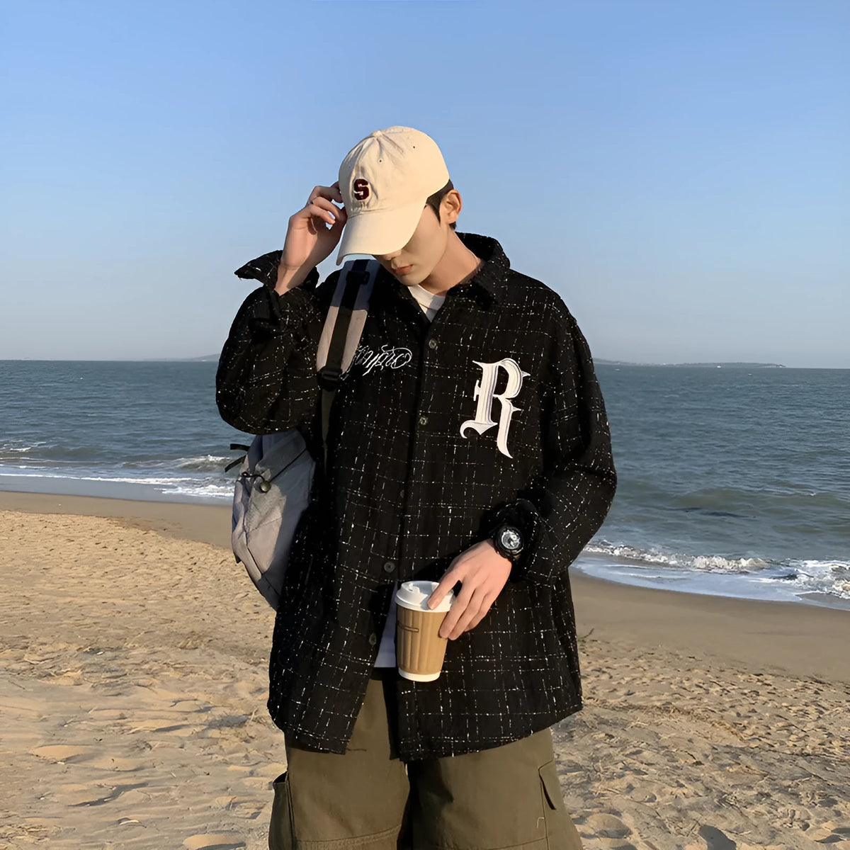 Long sleeve plaid shirt with embroidered letter detail, white or black, sizes S to XXL for men and women