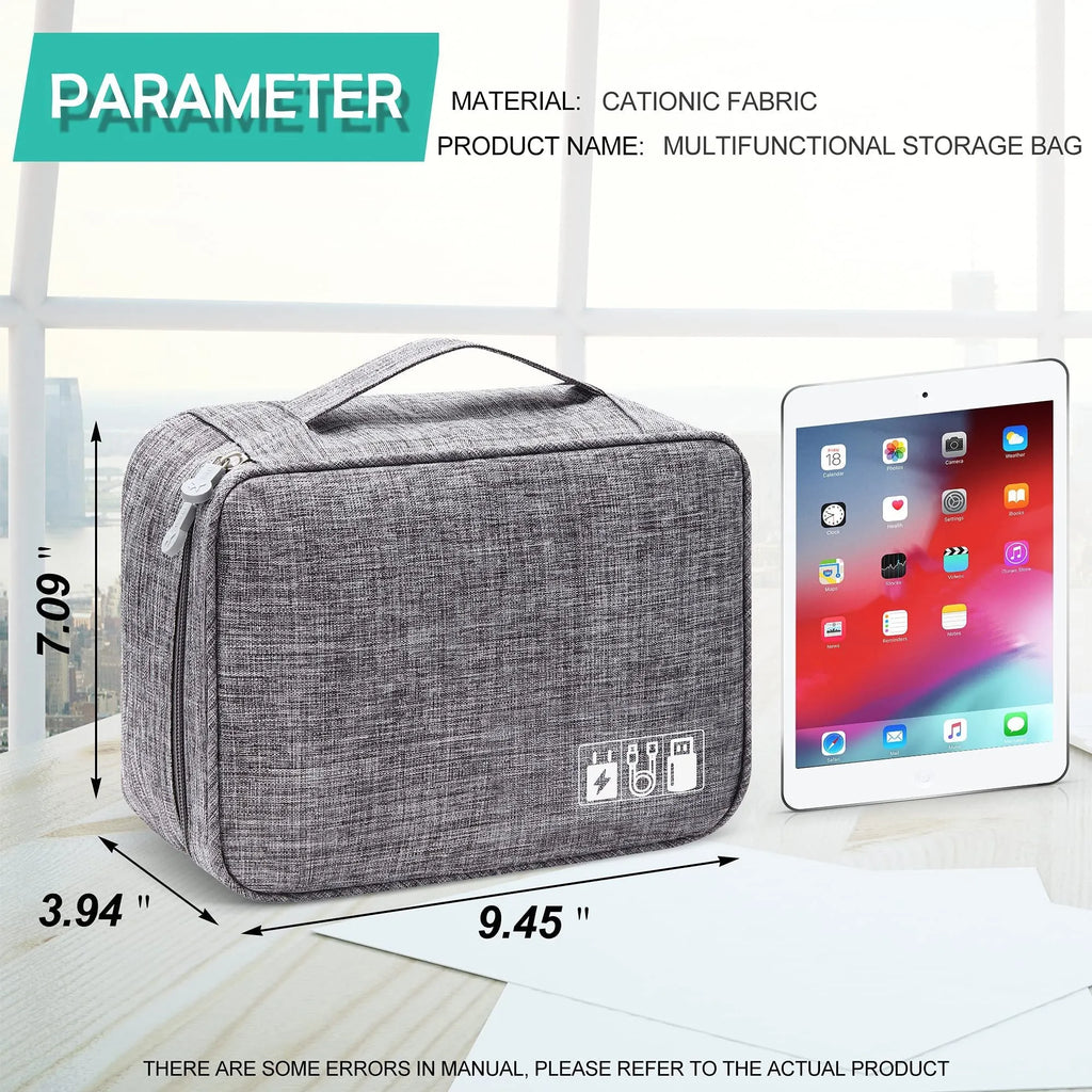 Black waterproof electronic cable organiser bag open to show mesh pockets, elastic loops, and removable padded dividers.