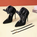 Thin shallow mouth women's shoes with pointed toe and strap fastening in black or red