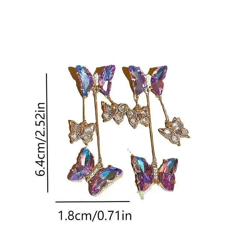 Silver needle crystal flowers butterfly tassel earrings in blue purple colour on alloy backing