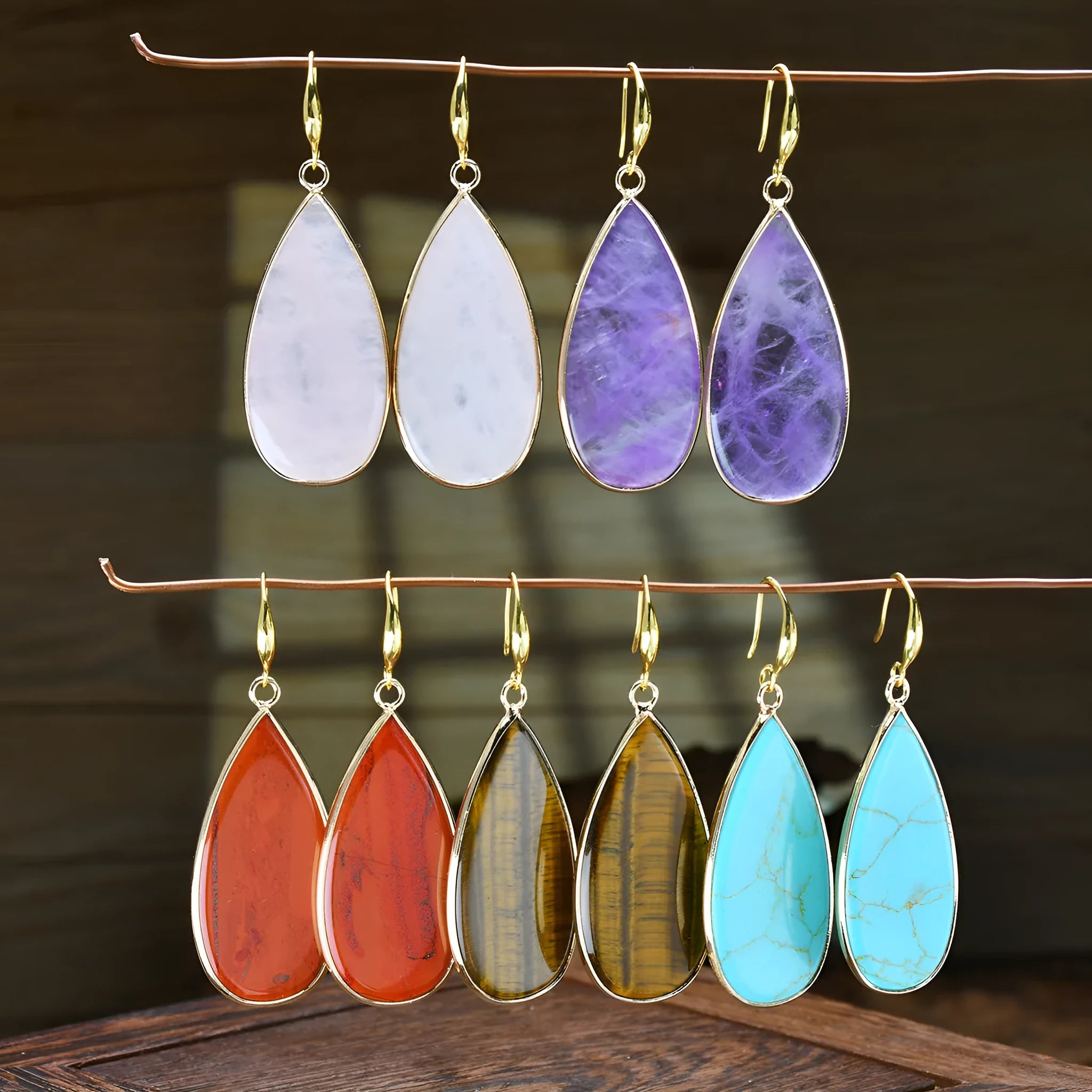 Vintage stone drop earrings with water droplet texture in tigereye, amethyst, or pink crystal colours