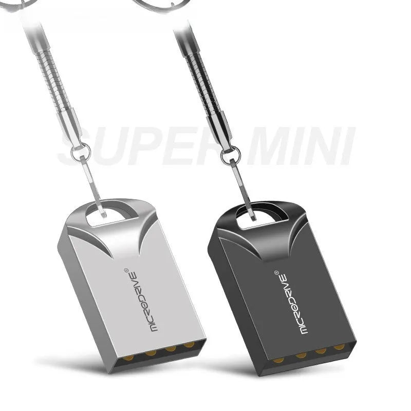 Small black and silver metal USB flash drive showing size comparison