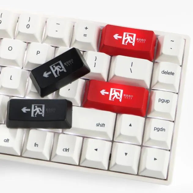 Transparent mechanical keyboard key cap with red safety evacuation exit symbol for backspace key.