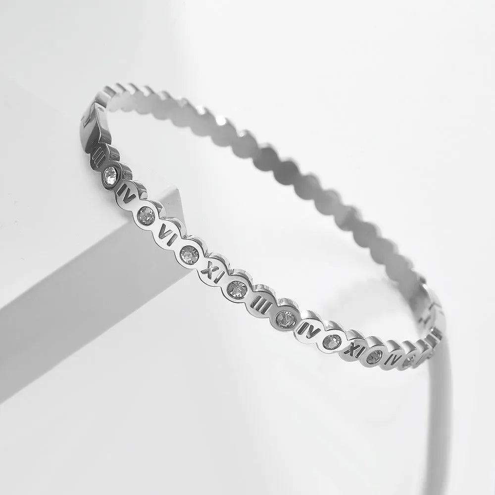 Korean style titanium steel bracelet with number detail in gold, rose gold, or steel colour.