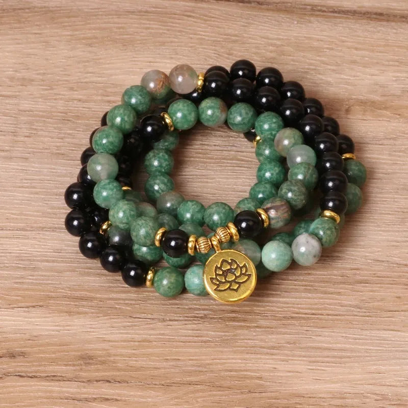 Green and black elastic beaded alloy bracelet with natural style design