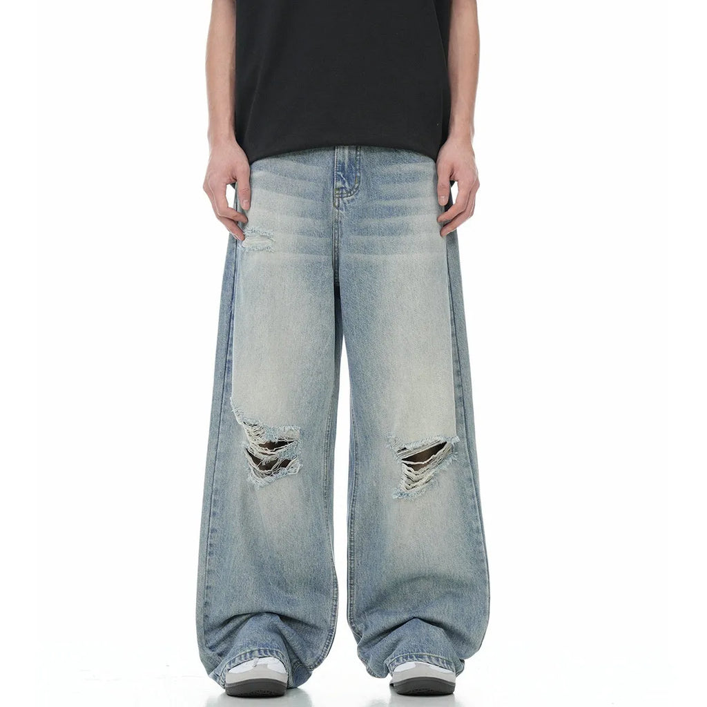 Blue retro straight-leg jeans with distressed detailing and adjustable waistband