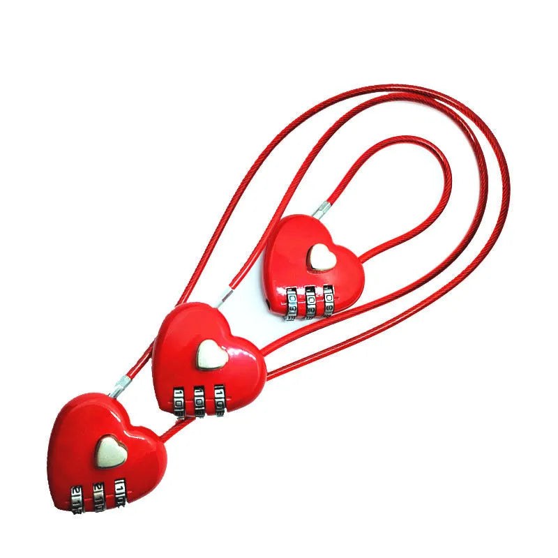 Peach heart design wire rope lock in ABS plastic, shown with steel cable, for securing bicycle helmets.