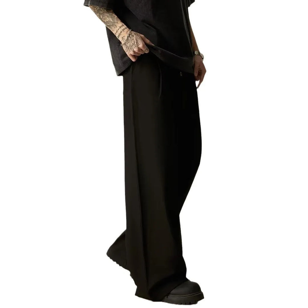 Men's solid colour polyester casual trousers with wide-leg design and elastic mid waist