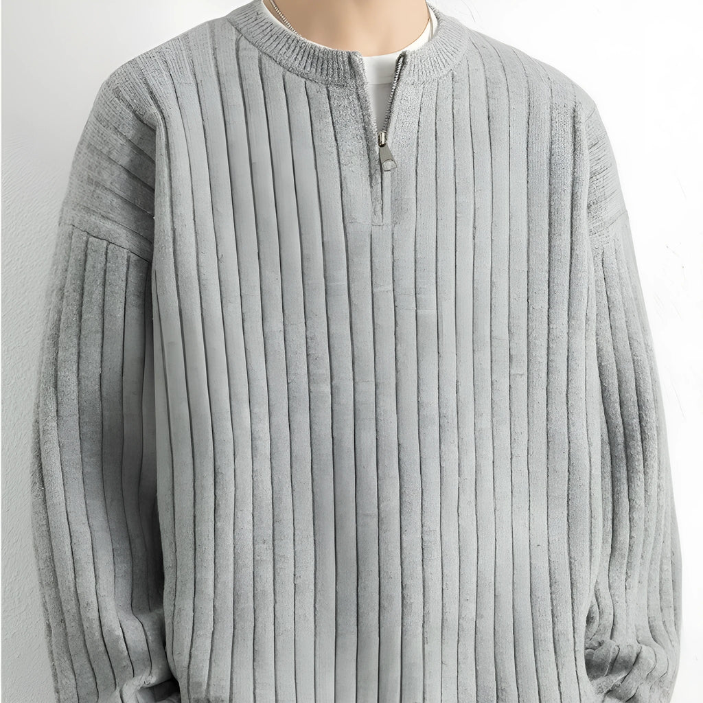 Men's grey half zip loose sweater with textured knit pattern and long sleeves