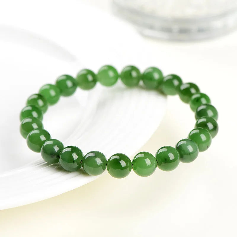 Natural Jasper Hetian jade bead bracelet in various sizes on a white background.