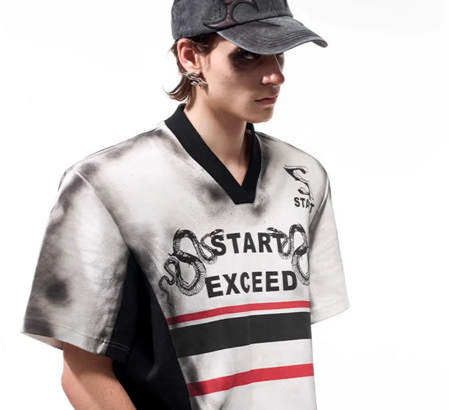 V-neck short sleeve polyester top with padded shoulders and letter snake pattern print in refined Korean style