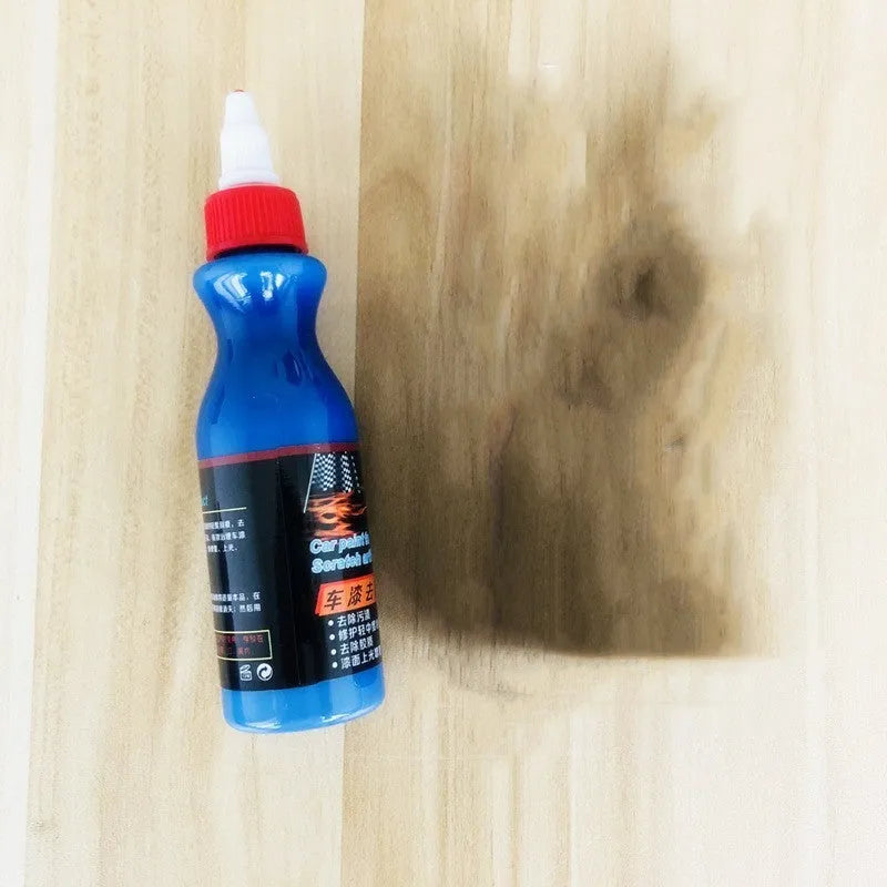 Small blue car wiping tool with scratch repair agent bottle for automotive paint touch-ups