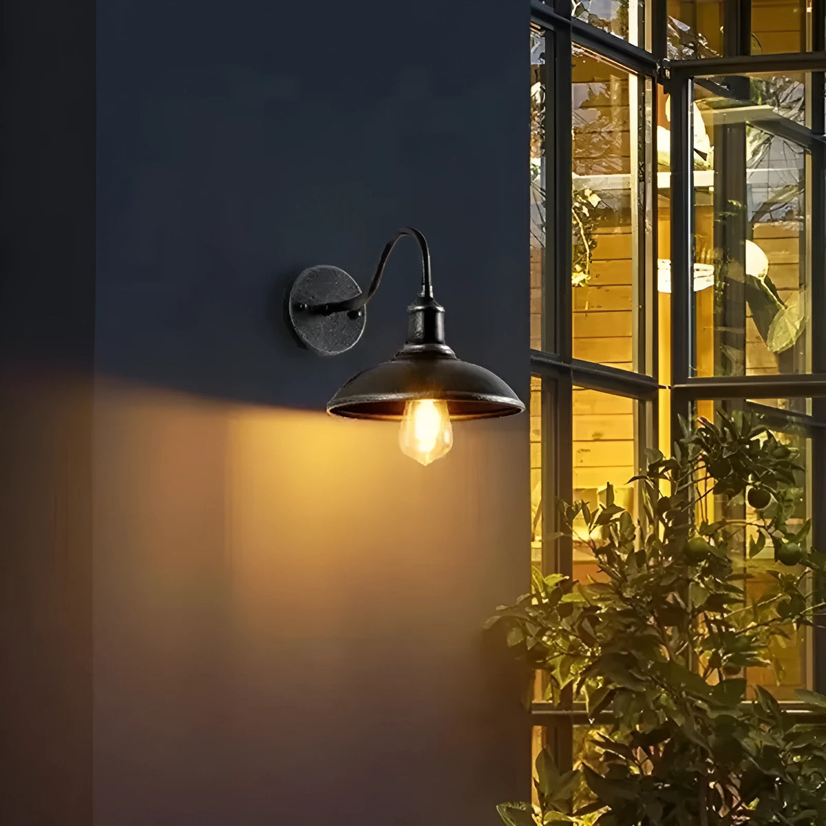Retro-style outdoor wall lamp in a choice of silver or copper finish with angled arms.