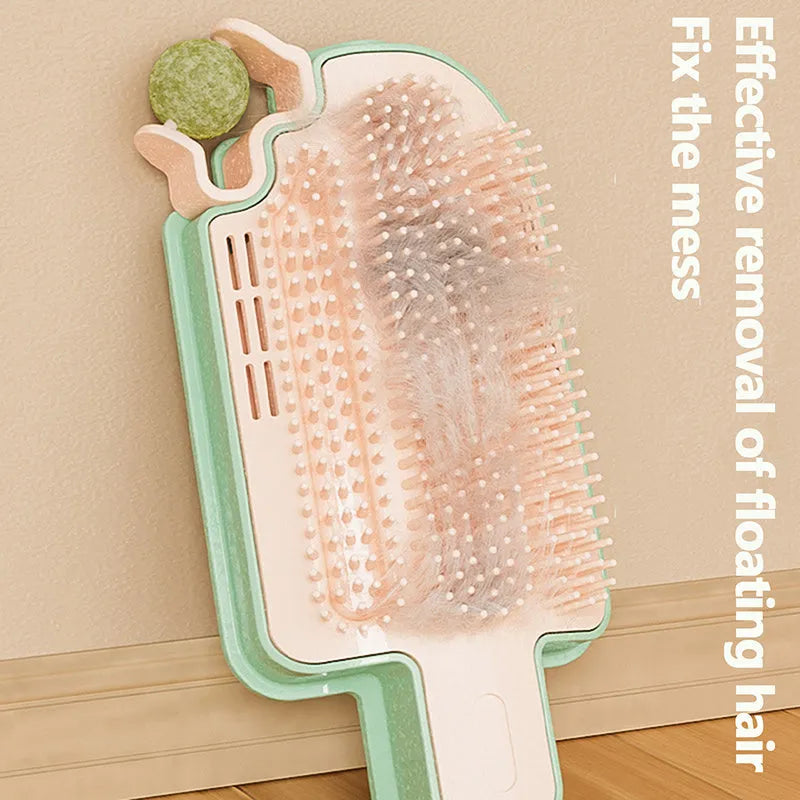 Ice cream cone shaped cat toy with mint ball and feather attachments on textured rubbing corner